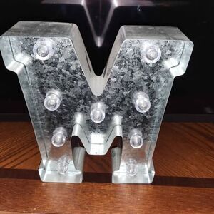 Vintage style metal letter M, w lights